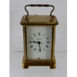 A Bayard Eight Day Brass Carriage Clock, white dial plate with black painted Roman numerals with