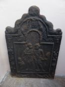 A Circa 19th Century Cast Iron Fire back, depicting figures, approx 67 x 45 cms