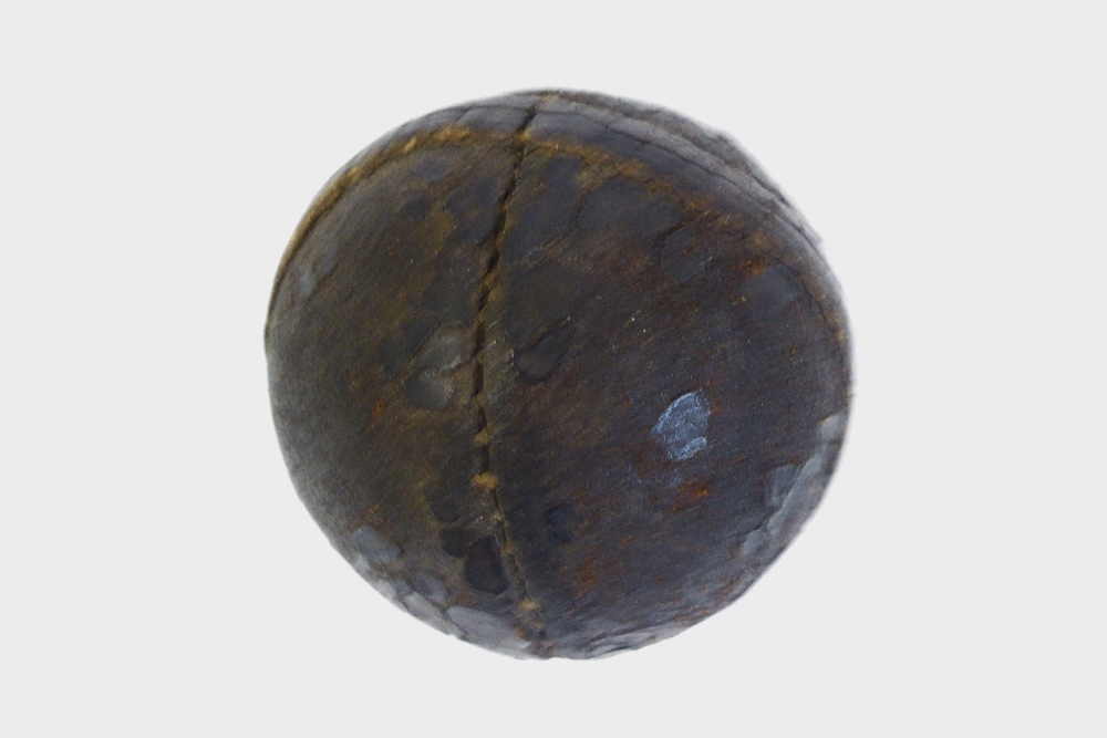 An Antique Stitched Leather Golf Ball.