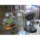 Two Antique Pocket Watch Stands, one ebonised the second mahogany, both with glass domes together