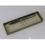 A Black Metal Parker Roller Ball Pen, in original box.