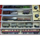 A Vintage TRIX Twin Railway Set, including two engines, miscellaneous carriages, trucks, transformer