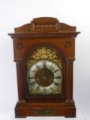 An Edwardian Oak Cased Mantel Clock, silvered Roman dial, approx 24 x 38 x 16 cms, clock nrd 3333,