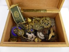 A Wooden Box Containing Various Military Insignia, sweetheart badges, medals, collar badges etc.
