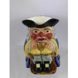 A Clarice Cliff Newport Pottery Co., Toby Jug, approx 16 cms.