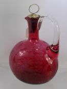 A Victorian Cranberry Glass Decanter, etched with fern design. (af)