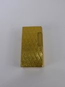 A Vintage Gold Plated Dunhill Lighter, marked K659.