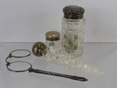 A Silver Topped Tear Form Cut Glass Perfume Bottle, marks rubbed, approx 14 cms together with a