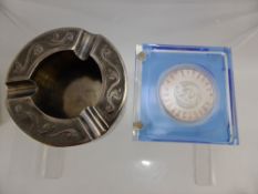 An Oriental Silver Ashtray, together with a Siamese silver coin and a Chinese silver 999 coin with