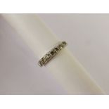 A Lady's 9 ct White Gold Half Eternity Ring, the ring set with seven diamonds approx 35 pts total,