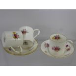 Royal Worcester Bone China Coffee Cans and Saucers, decorated with floral spray.