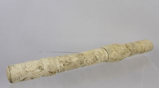 A 19th Century Japanese Meiji Period Ivory Tanto, the single tusk scabbard carved in low relief