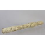 A 19th Century Japanese Meiji Period Ivory Tanto, the single tusk scabbard carved in low relief