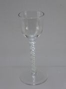 An Antique Georgian Wine Glass, with double twisted stem, with raised pontil mark.