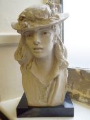 After August Rodin, Clay Bust, depicting a girl wearing a hat with flowers, approx 49 cms, raised on
