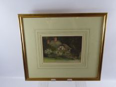 A Victorian Watercolour, depicting a Thatch Cottage, framed and glazed, approx 22 x 16 cms