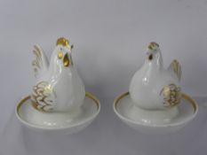 Two Royal Worcester Egg Cups, a cockerel and a hen in the original boxes.