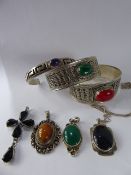 Three Lady's Vintage Silver Middle Eastern Bangles, one set with red stone the other tiger's eye,