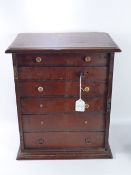 A Victorian Mahogany Miniature Chest of Drawers, together with an antique writing slope. (2)