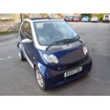 A 2004 Registered 4/2 Smart Car, the City Passion 61 Automatic Convertible having covered only 54