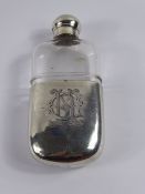 An Antique Solid Silver Hip Flask. The flask having silver top and drinking cup to base, approx 11