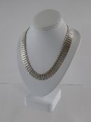 A Lady's Solid Silver Fancy Necklace, in original box, approx wt 17 gms.
