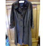 A Lady's Vintage Seal Coat, size Small approx length 102 cms, the coat having leather button holes