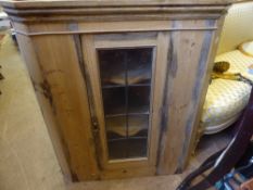 A Vintage Pine Astral Glaze Corner Cupboard, the cabinet having two scallop shaped shelves, approx