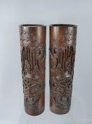 A Pair of Chinese Carved Bamboo Pillar Vases, depicting a figure in a boat, approx 38 cms.