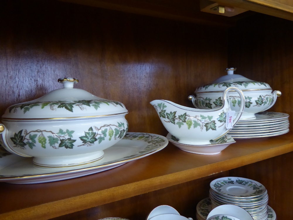 A Wedgwood 'Clara' Dinner Service, including eight large dinner plates, eight dessert plates, oval