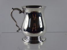 A Silver Tankard Birmingham hallmark, dated 1975, approx wt 370 gms.