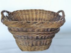 A Generous Vintage French Grape Harvest Basket, from the Champagne region.