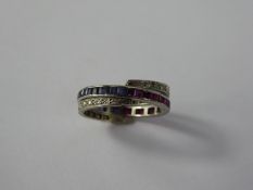 A Lady's Platinum Diamond, Ruby and Sapphire Full Eternity Hinge Ring, size R, 23 rubies, 22