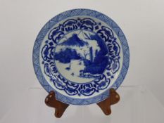 A Chinese Blue and White Plate, depicting a pagoda landscape, approx 15.5 cms dia, Qing Dynasty (