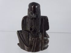 An Antique Hard Stone Figure of a Holy Man, approx 12.5 cms