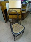 A Victorian Rattan Seated Lacquered Bedroom Chair, together with a teak fronted sewing box. (2)