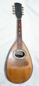 An Antique Bowlback Mandolin by Ficarra Joseph of Port Said, Egypt, the inlaid mandolin with