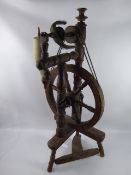 A Vintage Mixed Wood Spinning Wheel.