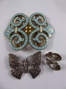 A Silver and Marcasite Butterfly Brooch, earrings and blue enamel belt buckle. (3)