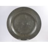 An English Pewter Single Reeded Charger, with marriage triad 'RPH' to rim, approx 38 cms dia,
