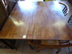 A Victorian Mahogany Drop Leaf Supper Table, the table having turned legs on casters, approx 103 x