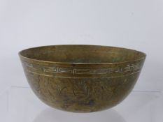 An Antique Chinese Brass Bowl, with decorative panel design with character marks to base for Xuan