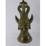A Metal Hindu Horned Deity, having weighted base, approx 30 cms high.