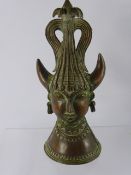 A Metal Hindu Horned Deity, having weighted base, approx 30 cms high.