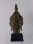 A South East Asian Figure of Buddha's Head, approx 24 cms high.