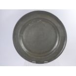 An English Pewter Single Reeded Charger, with marriage triad 'INH' to rim, approx 42 cma dia,