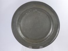 An English Pewter Single Reeded Charger, with marriage triad 'INH' to rim, approx 42 cma dia,