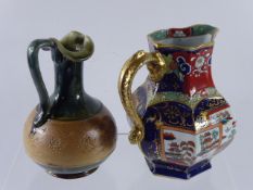 An Antique Masons Jug, with fish form handle, together with a Lambeth ware Royal Doulton vase,
