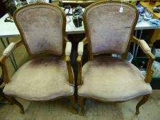 A Pair of Antique Beech Salon Chairs, the chairs having floral carved decoration to top. (2)