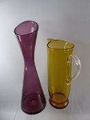 A White Friars Amethyst Vase, approx 39 cms, an amber water jug, approx 30 cms, together with two